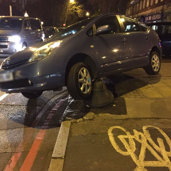 Car Mounts Bollard In East Putney 