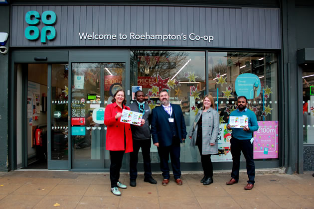 Fleur Anderson with staff at the Co-op in Roehampton 