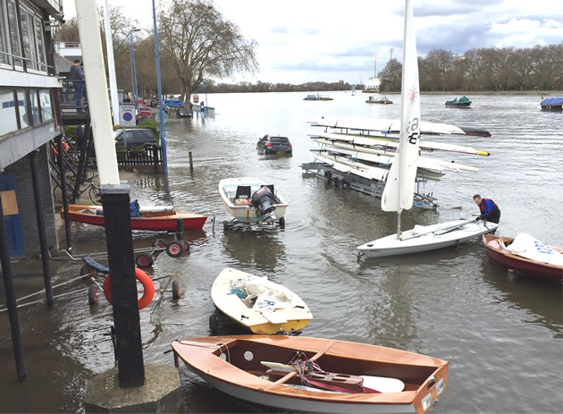 car at high tide on Putney Embankment