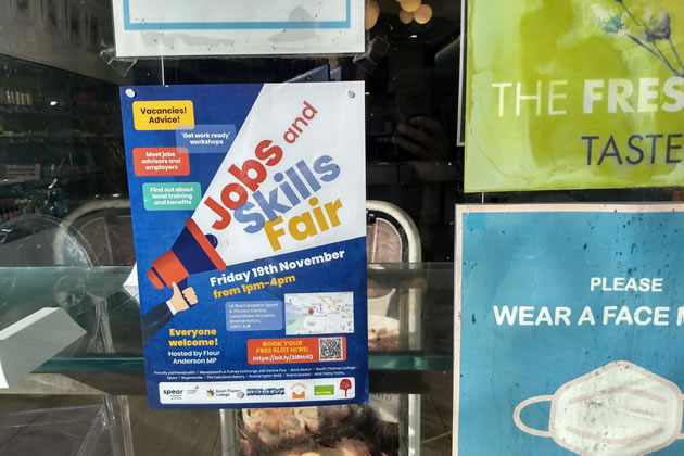 A poster for the Jobs and Skills Fair in a local shop window 