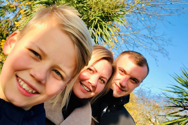 Masha (centre) with her family