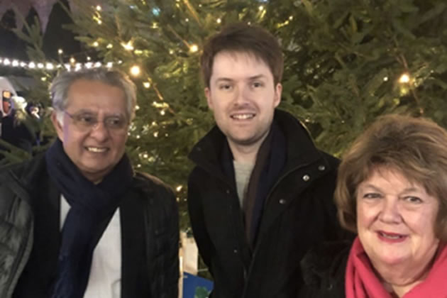 Wandsworth Council Leader Cllr Ravi Govindia with James Jeffreys and West Putney Councillor Jane Cooper in front of the newly lit Christmas tree