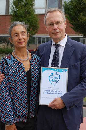 Shereen and Mr Manisali with the NHS Heroes award